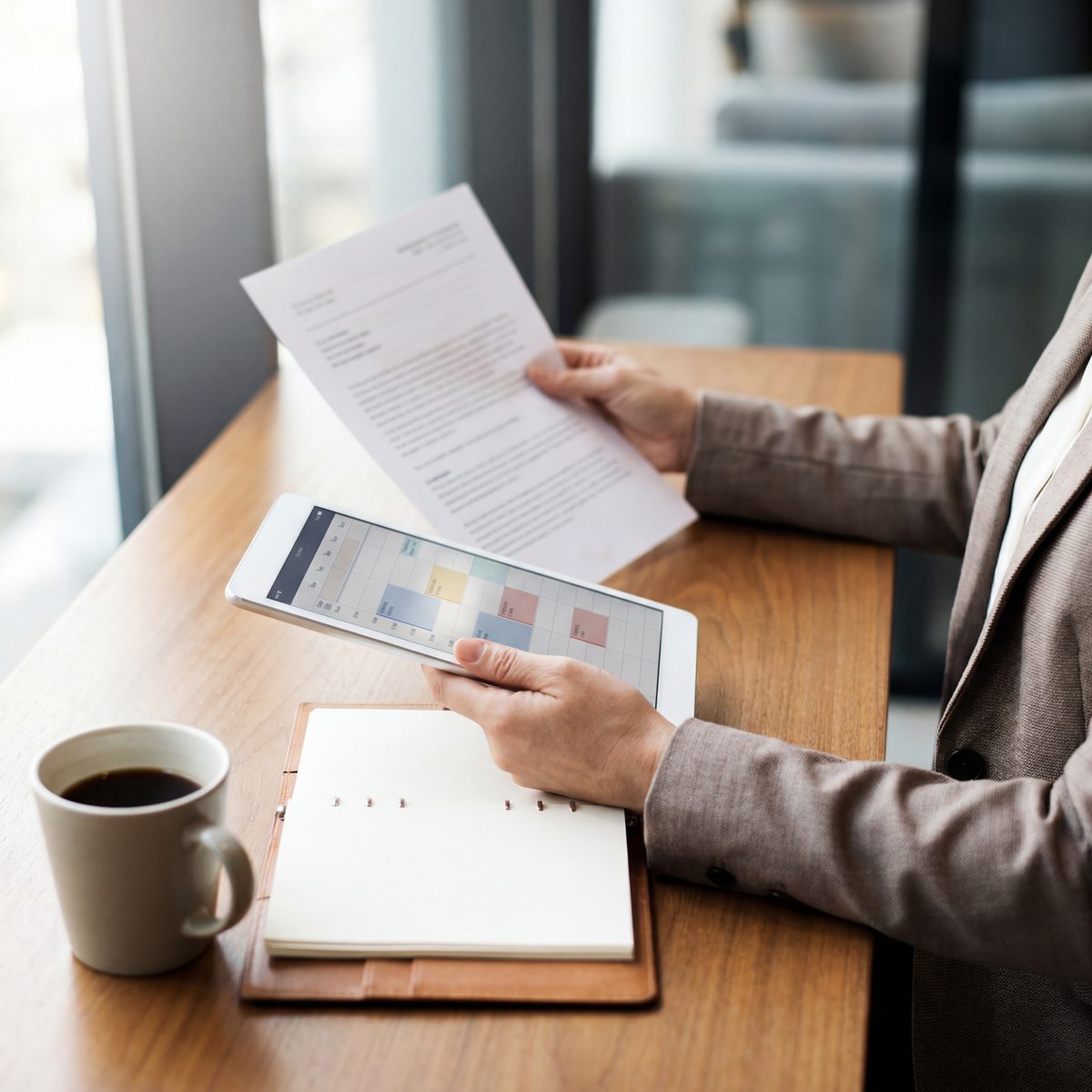 Recruiter reviewing a candidate resume and interview calendar
